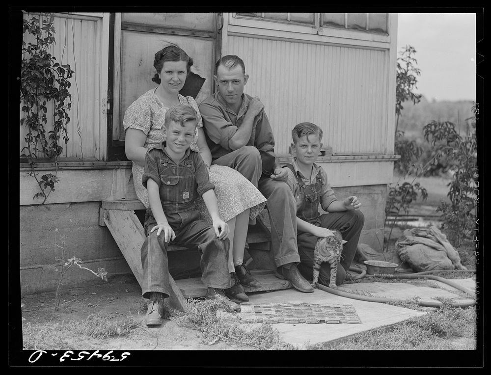 Mr. and Mrs. Harvey Renninger with sons, Winfield and Richard, members of Two River Non-Stock Cooperative, FSA (Farm…