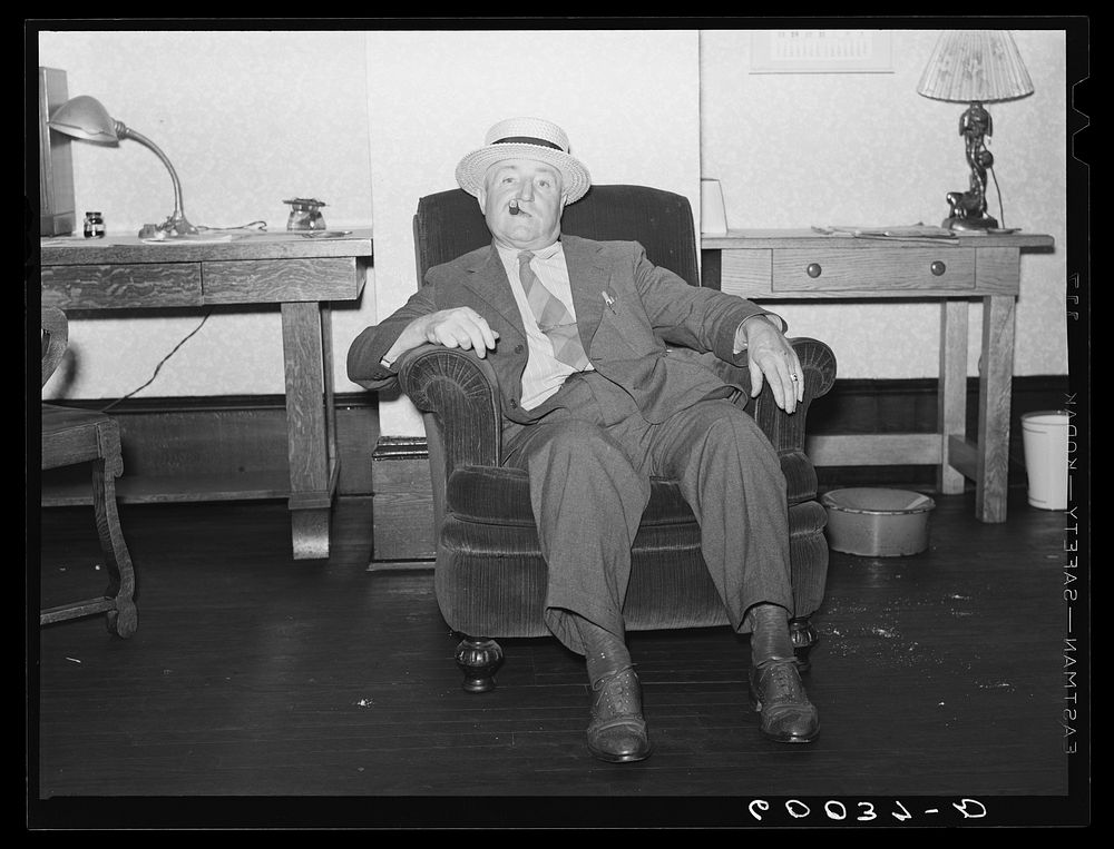 Traveling salesman in hotel lobby. Elkins, West Virginia. Sourced from the Library of Congress.