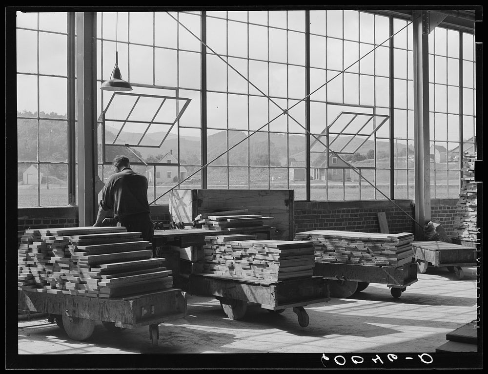 Dimension lumber plant at Tygart Valley Homesteads, West Virginia. They cut wood to size as ordered by furniture companies.…