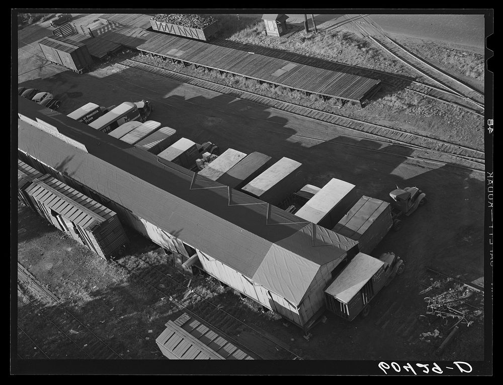 Trucks loading at terminal warehouse. Minneapolis, Minnesota. Sourced from the Library of Congress.