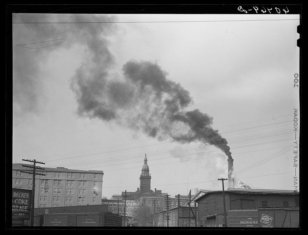[Untitled photo, possibly related to: Dubuque, Iowa. The smoke comes from Dubuque's largest industry, the sash and door…
