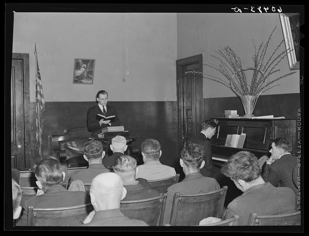 [Untitled photo, possibly related to: Visiting preacher conducting evening service at city mission. Dubuque, Iowa]. Sourced…
