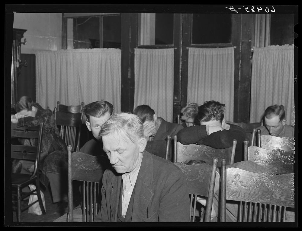 Prayer, evening service. City mission, Dubuque, Iowa. Sourced from the Library of Congress.