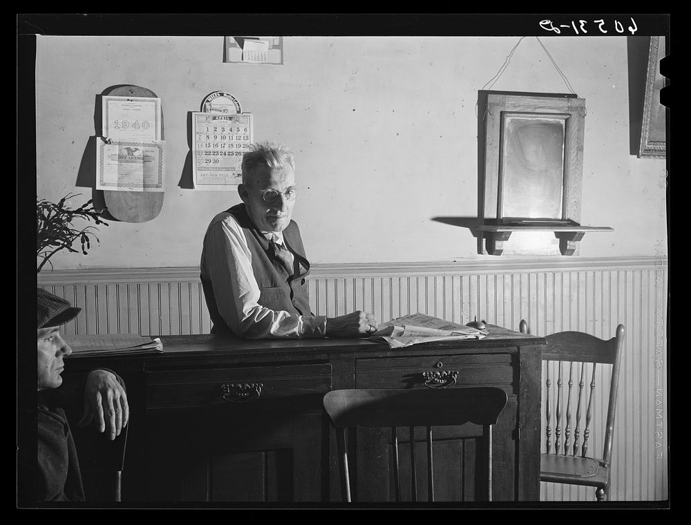 A.E. Blum, proprietor of thirty-five cents a night hotel. Dubuque, Iowa. Sourced from the Library of Congress.