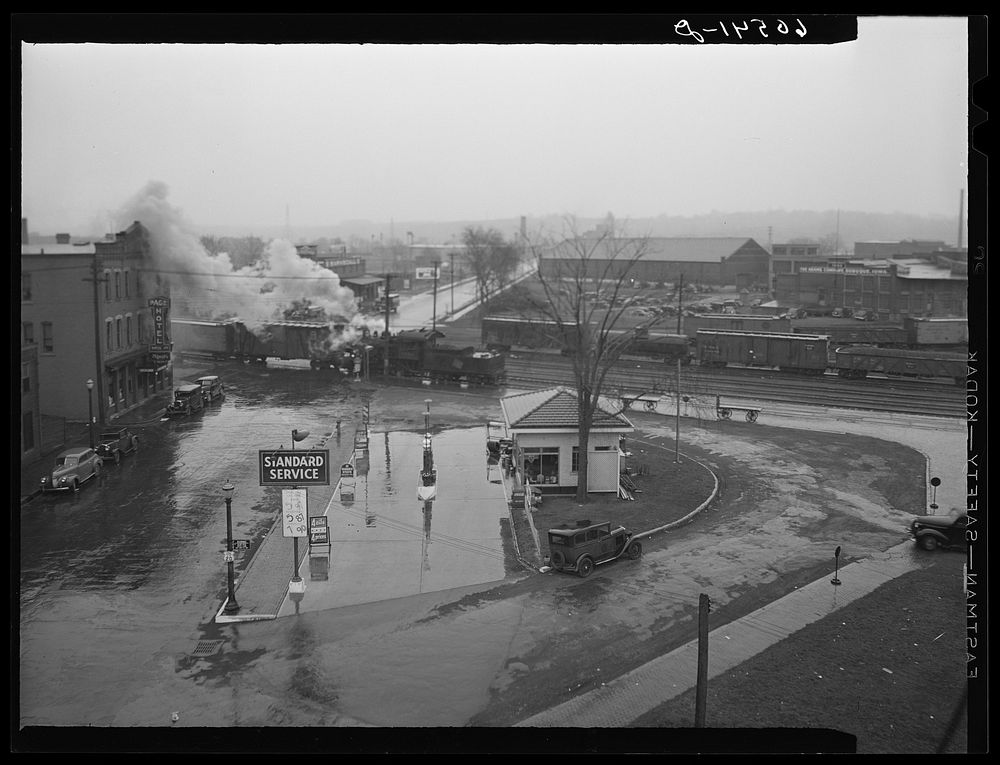 Gas station on rainy day. Dubuque, Iowa. Sourced from the Library of Congress.