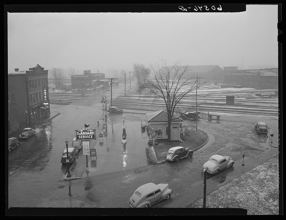 [Untitled photo, possibly related to: Gas station on rainy day. Dubuque, Iowa]. Sourced from the Library of Congress.