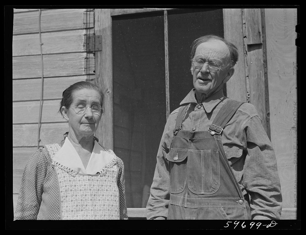 [Untitled photo, possibly related to: A.E. Scott and his wife on their farm northeast of Scottsbluff, Nebraska (see general…