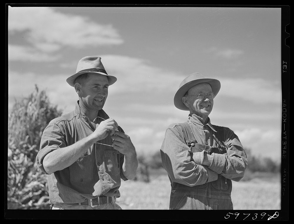 A.E. Scott and his son Charles on their farm northeast of Scottsbluff, Nebraska. Sourced from the Library of Congress.