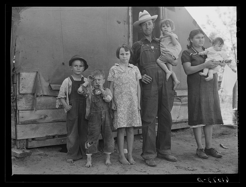 Farmer and family living in tent on poor land of Mississippi riverbottoms. They will move to one of the Delmo labor homes.…