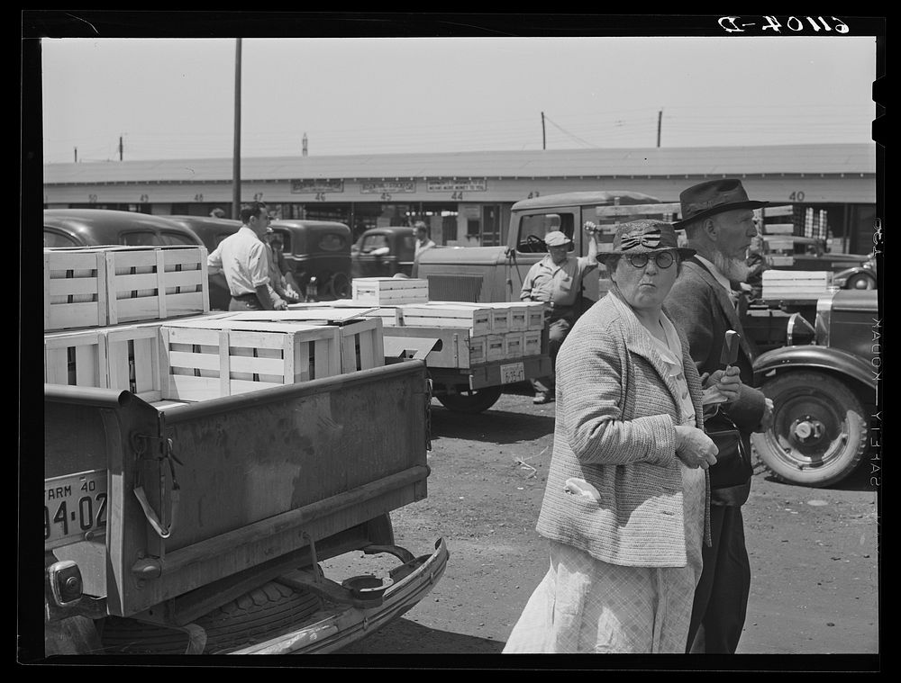Visitors at fruit market. Benton Harbor. Michigan. Sourced from the Library of Congress.