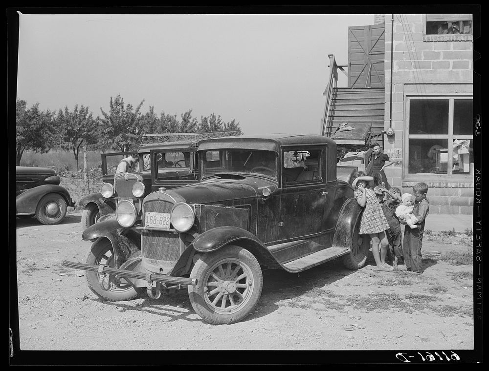 Fruit pickers from Arkansas about to move on in search of more work. Berrien County, Michigan. Sourced from the Library of…