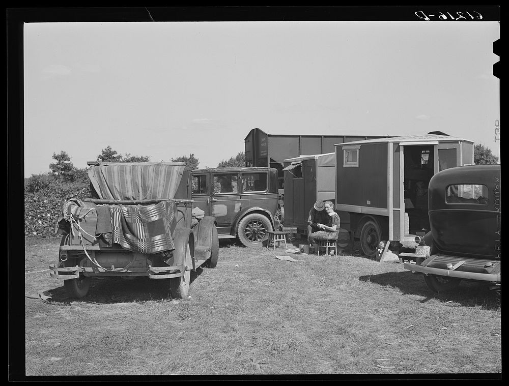 Camp of migrant fruit workers in field on outskirts of town. Berrien County, Michigan. Sourced from the Library of Congress.