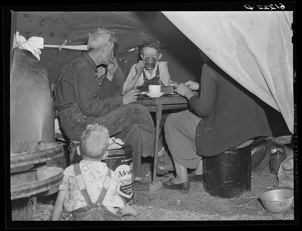 Migrant fruit workers at dinner. Berrien County, Michigan. Sourced from the Library of Congress.