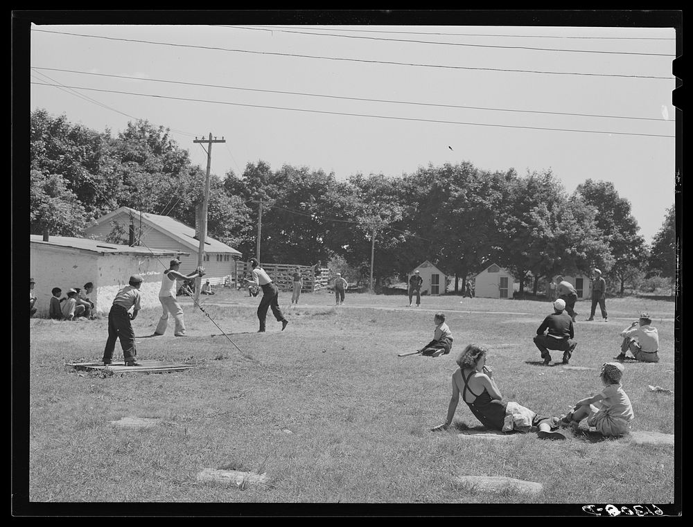 Ball game in cherry pickers' camp. Housing conditions are very good. Most of the pickers are young boys and girls, sixteen…