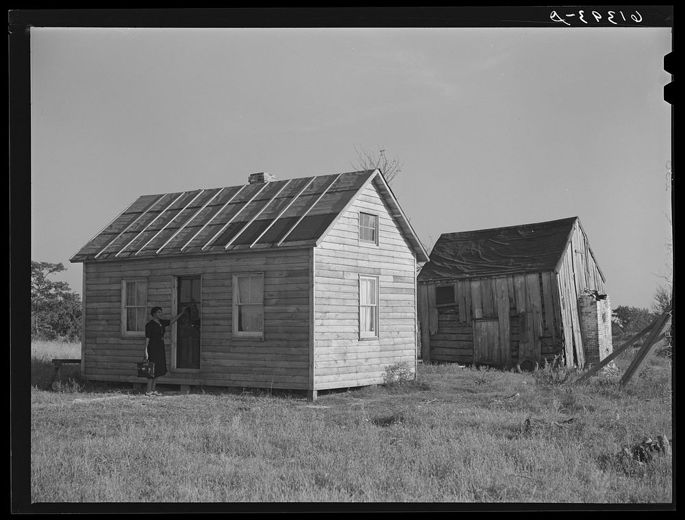 Old and new house of George W. Green, FSA (Farm Security Administration) borrower. Saint Mary's County, Maryland. Magaritte…