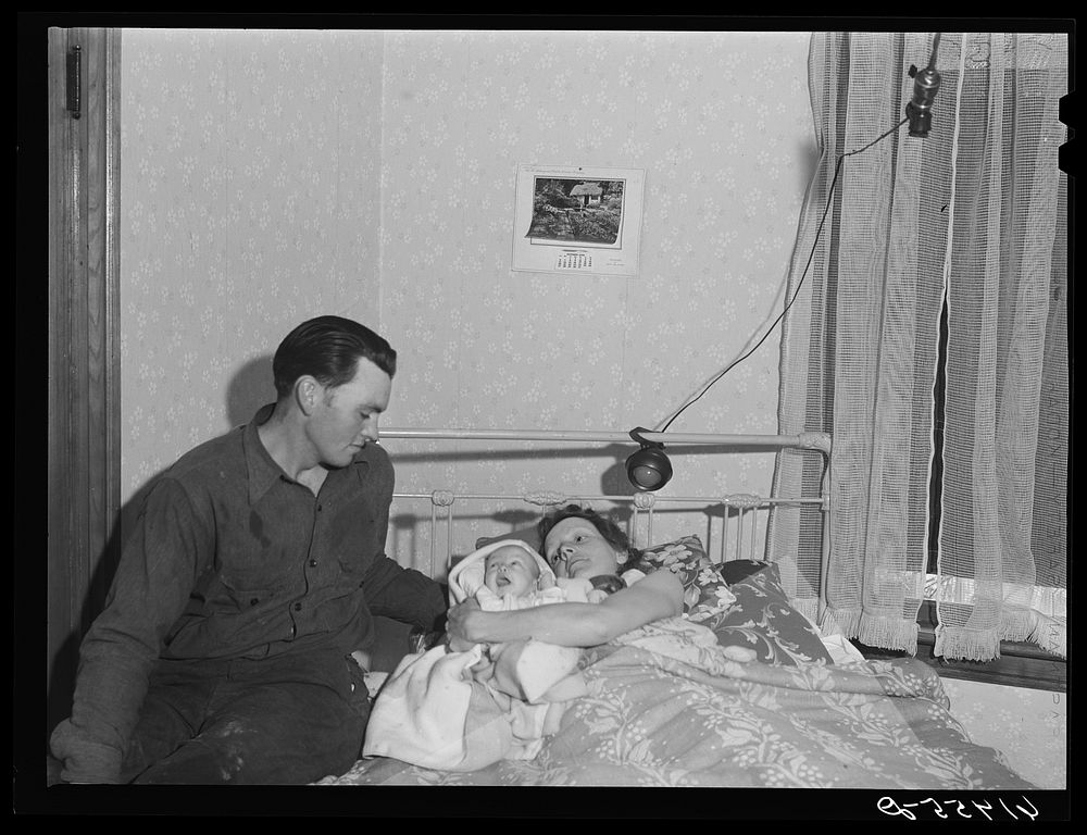 Mr. Atkinson, wife, and month-old baby. They are FSA (Farm Security Administration) borrowers. Cavalier County, North…