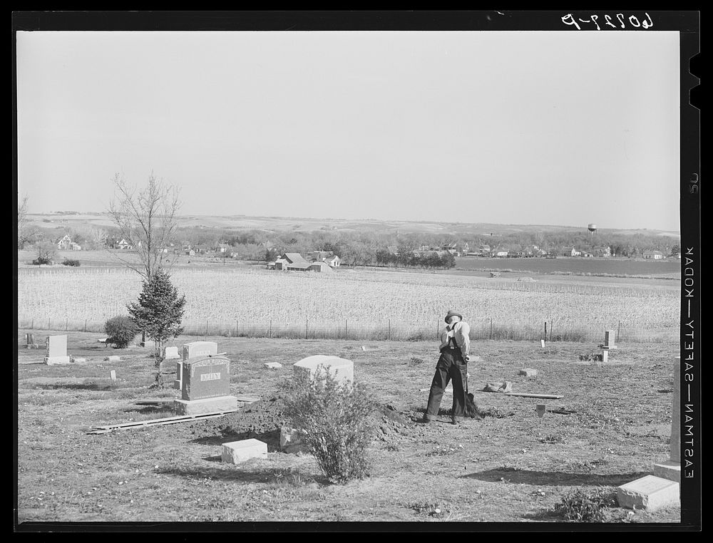 Digging a grave. Graveyard on the outskirts of Woodbine, Iowa. Sourced from the Library of Congress.