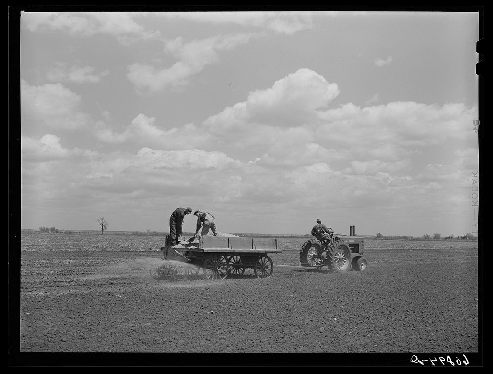 Spreading lime for fertilizer. Jasper County, Iowa. Sourced from the Library of Congress.