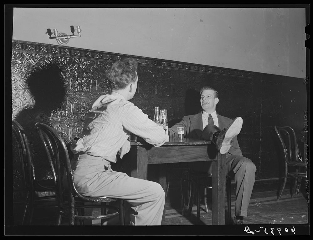 [Untitled photo, possibly related to: Young couples in beer parlor. Cairo, Illinois]. Sourced from the Library of Congress.