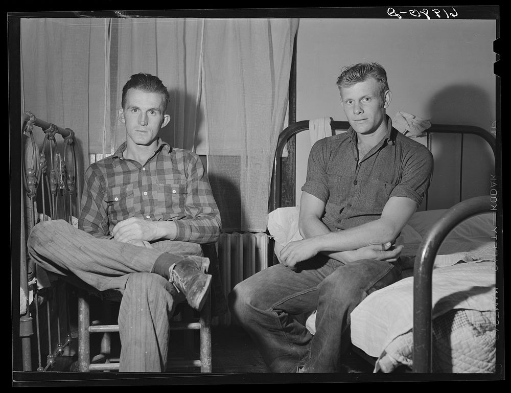 Construction workers in boardinghouse room. Radford, Virginia. Sourced from the Library of Congress.
