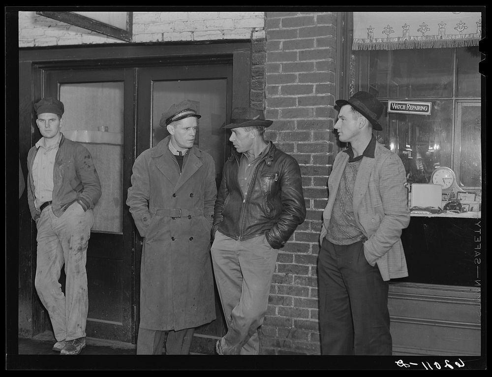 [Untitled photo, possibly related to: Men on the street in Radford, Virginia, just before change of shift]. Sourced from the…