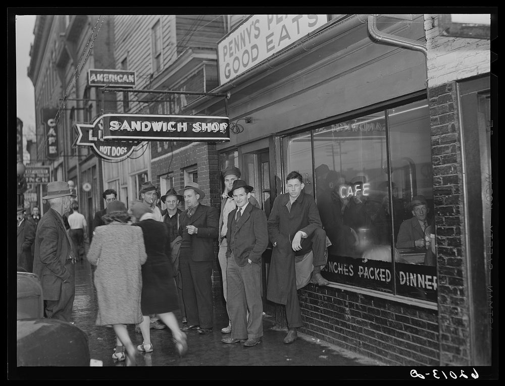 Men on the street in Radford, Virginia, just before the change of shift. Sourced from the Library of Congress.