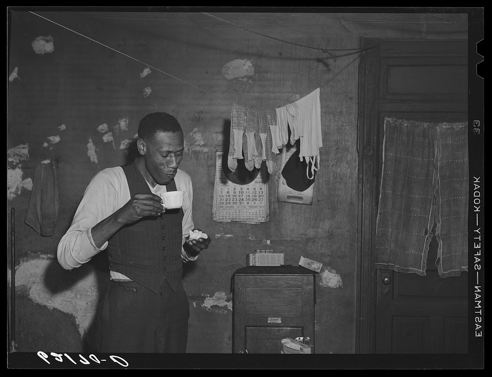 [Untitled photo, possibly related to: Steelworker eating lunch in his apartment. Aliquippa, Pennsylvania]. Sourced from the…