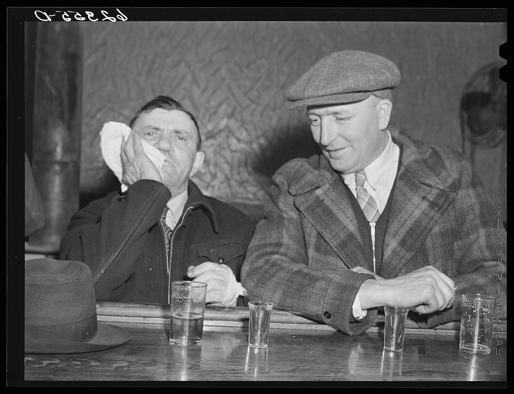 Steelworkers in beer parlor. Ambridge, Pennsylvania. Sourced from the Library of Congress.