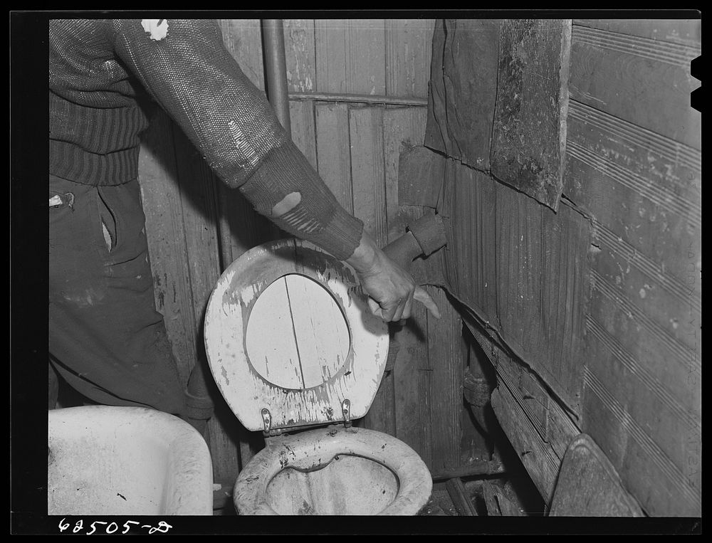 Bathroom in house which rents for sixteen dollars a month. Norfolk, Virginia. Sourced from the Library of Congress.