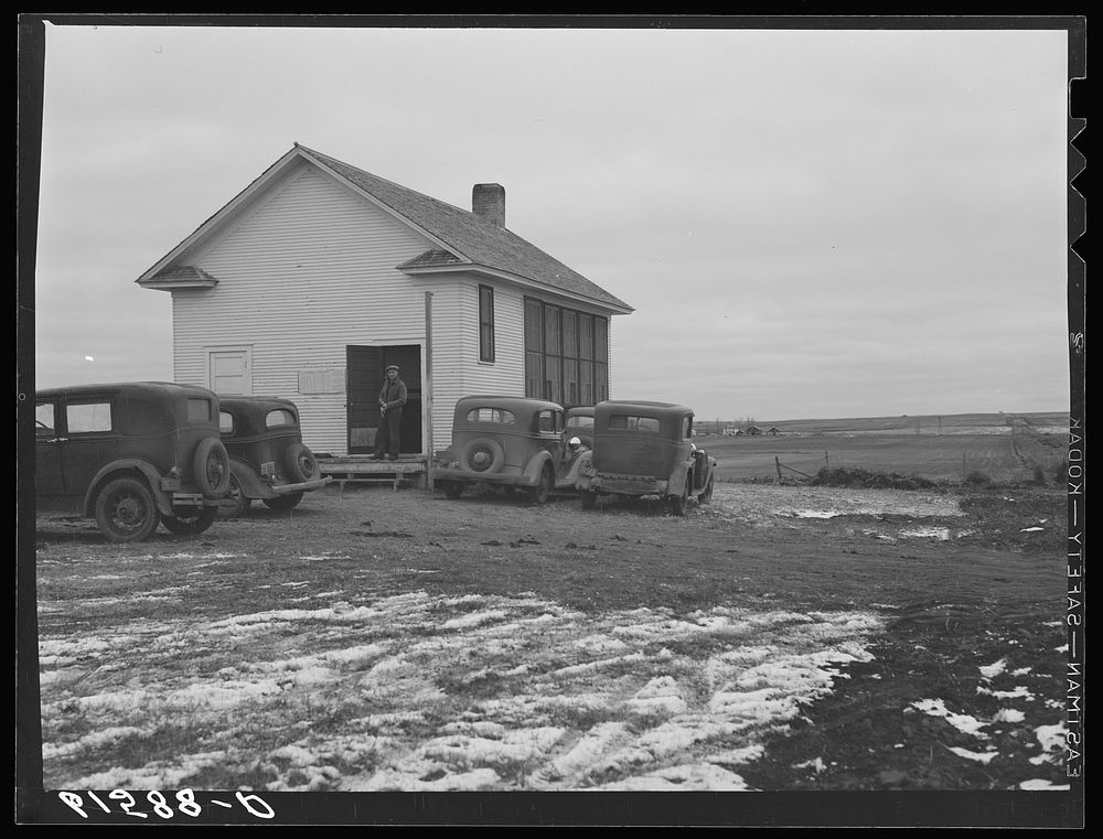 Schoolhouse where farmers are voting, election day, 1940. Beaver Creek precinct, McIntosh County, North Dakota. Sourced from…