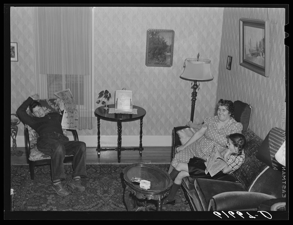 [Untitled photo, possibly related to: L.M. Schulstad, traveling salesman for hardware company, at home with his family.…