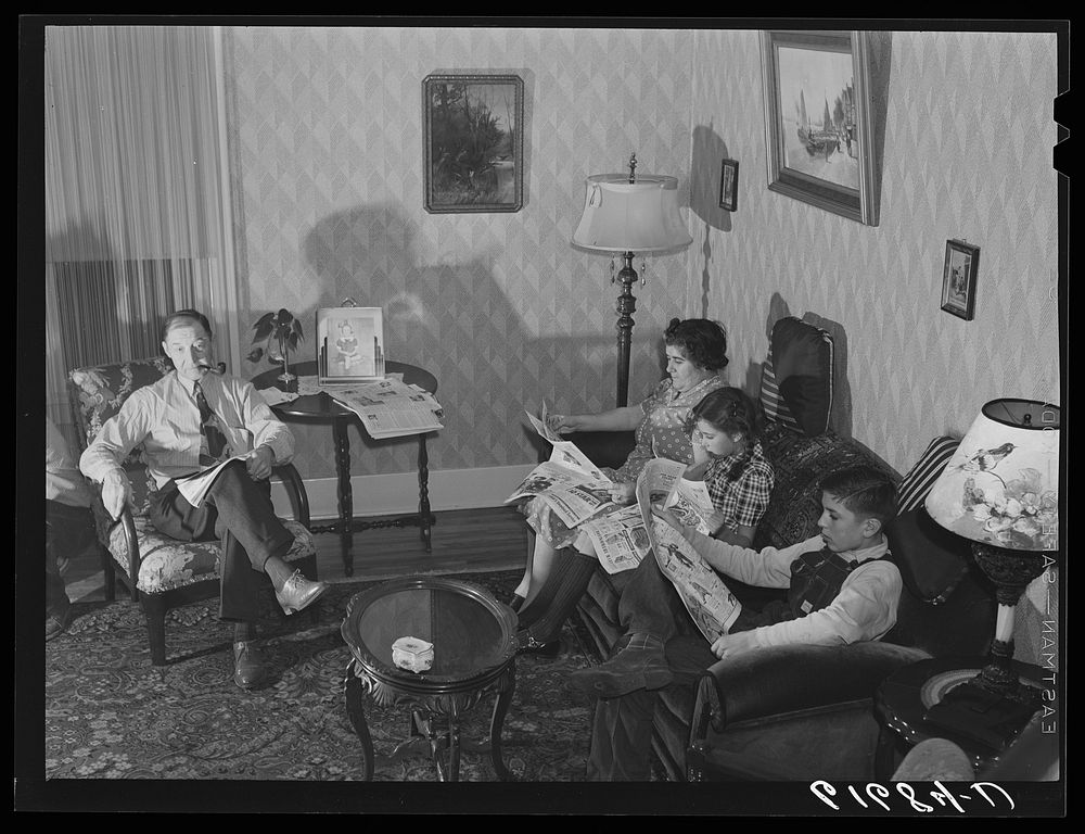 L.M. Schulstad, traveling salesman for hardware company, at home with his family. Aberdeen, South Dakota. Sourced from the…