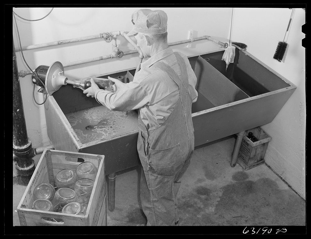 [Untitled photo, possibly related to: Washing bottles at pasteurizing plant. Greendale, Wisconsin]. Sourced from the Library…