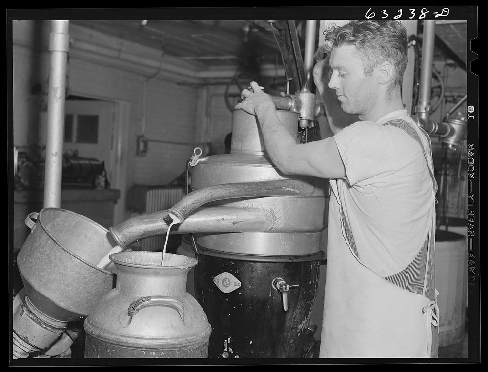 Operating cream separator. Cheese factory. Madison, Wisconsin. Sourced from the Library of Congress.