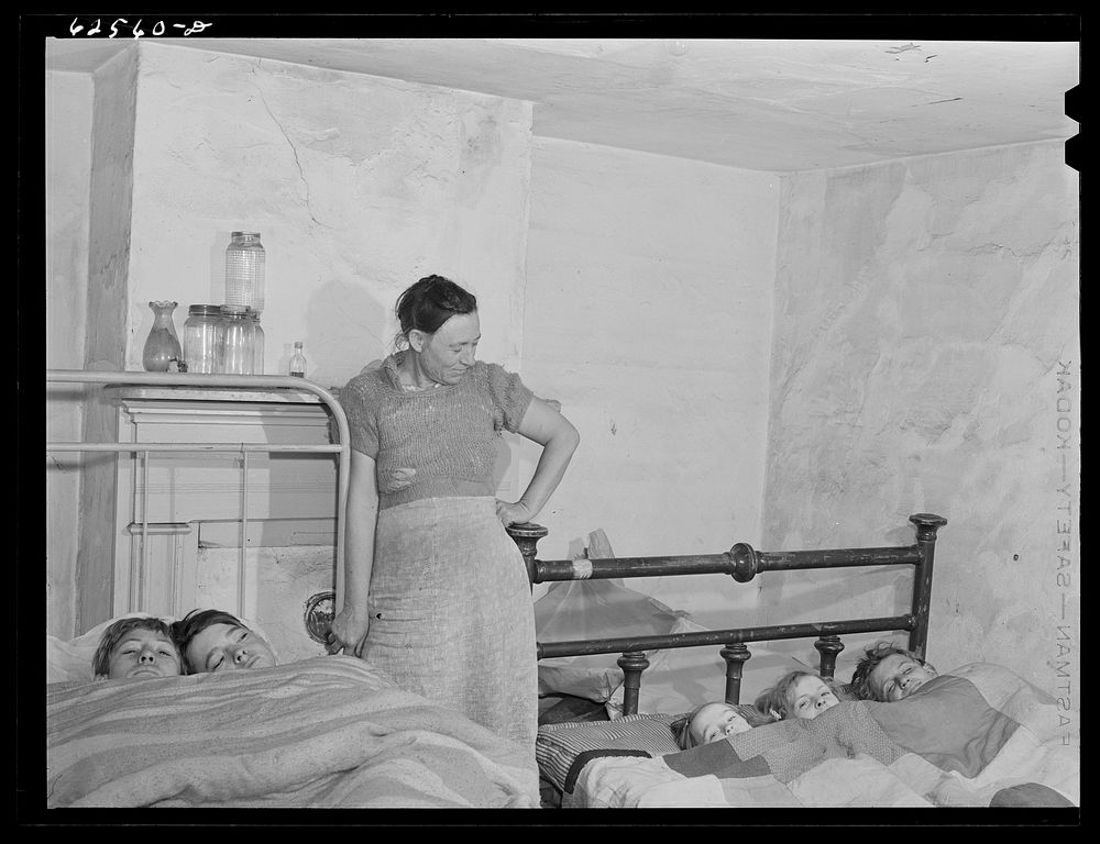 Mother and children from North Carolina farm. They came to Norfolk, Virginia so husband and older sons could get employment…