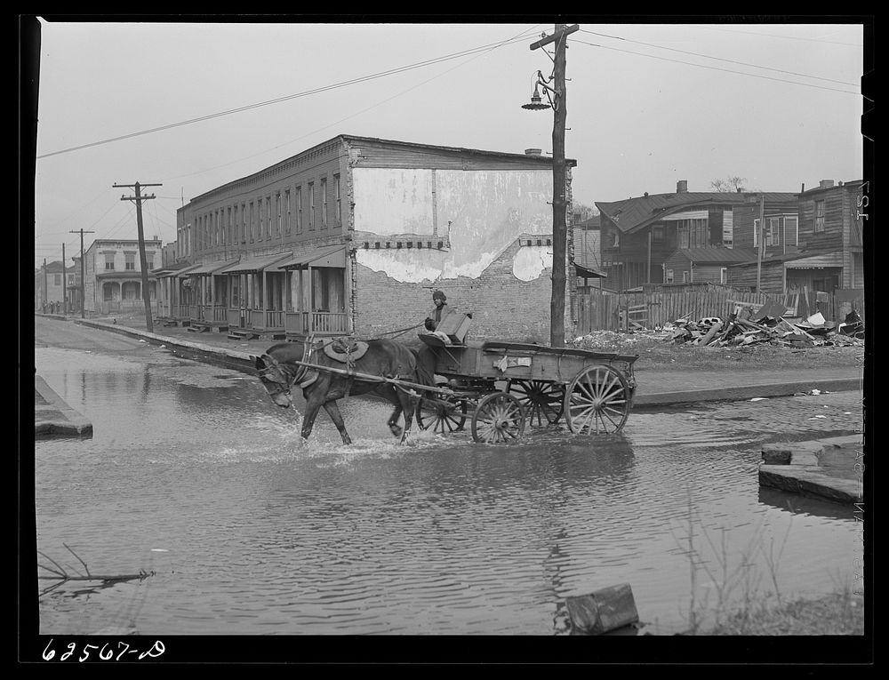 Backed up sewer in   district. Norfolk, Virginia. Sourced from the Library of Congress.