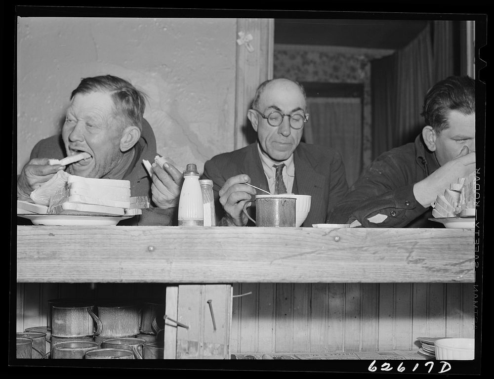 Men eating at Salvation Army. Newport News, Virginia. Sourced from the Library of Congress.