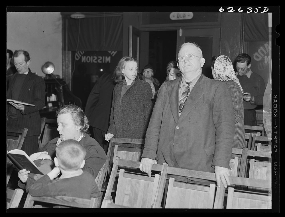Hymn singing. Evening service at Helping Hand Mission. Portsmouth, Virginia. Sourced from the Library of Congress.