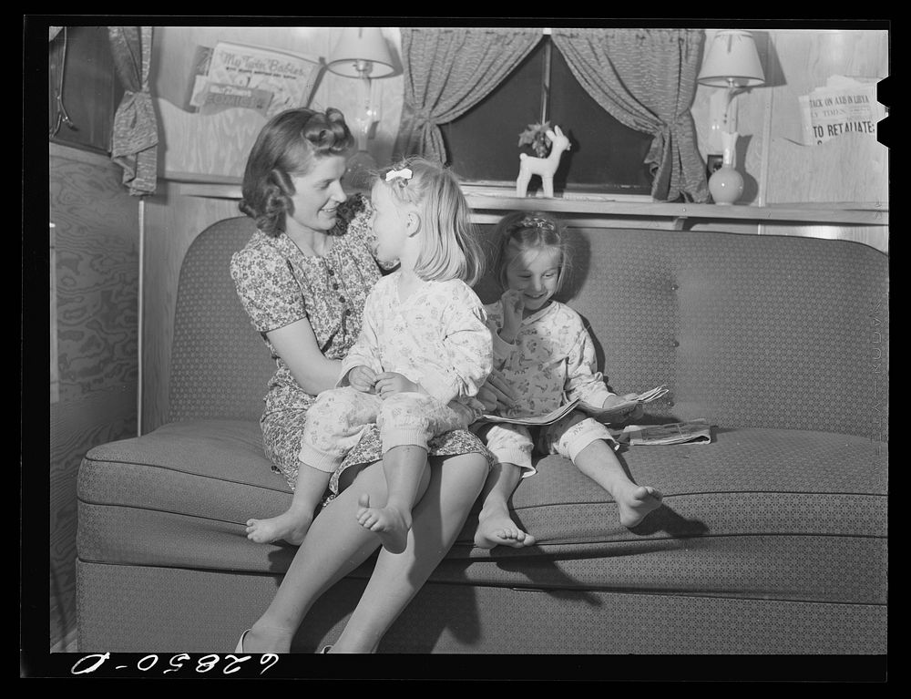 [Untitled photo, possibly related to: Mrs. Jack Cutter and two children in their trailer at FSA (Farm Security…
