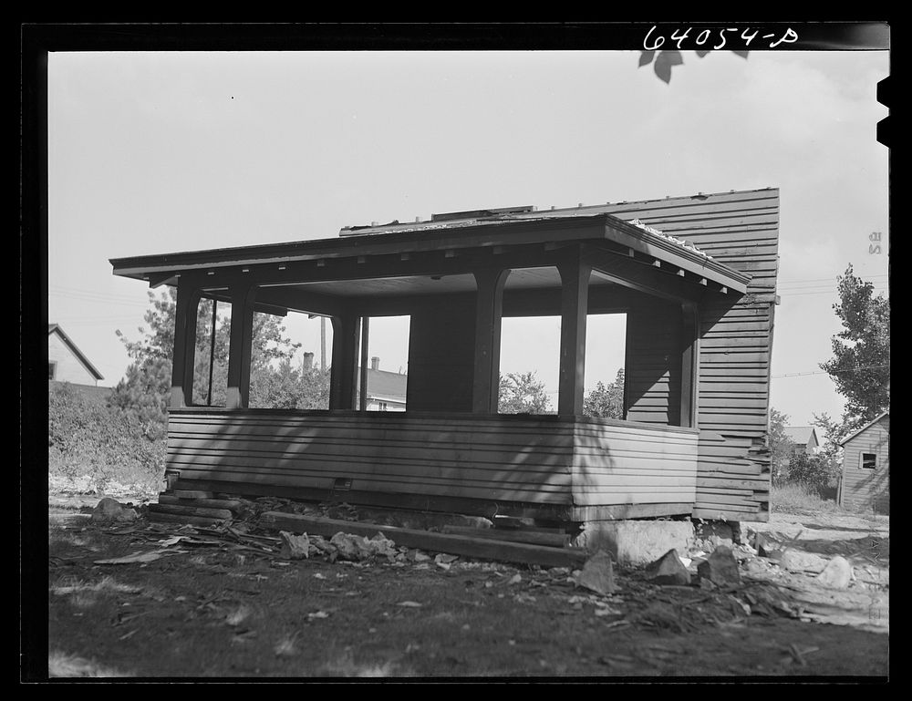 Houses being torn down in North Hibbing, Minnesota. Sourced from the Library of Congress.