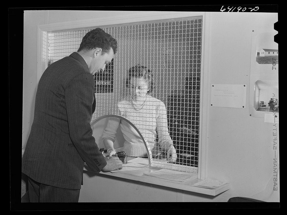 Defense worker applying for room in FSA (Farm Security Administration) dormitory near Aberdeen proving grounds. Aberdeen…