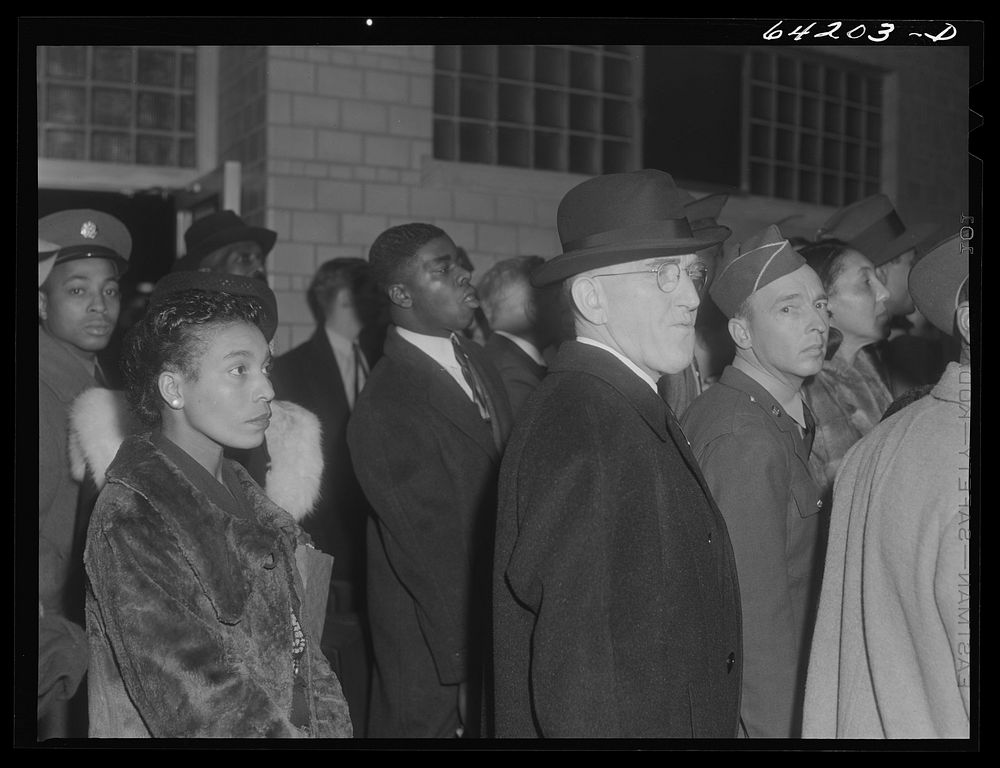 Washington, D.C. Greyhound bus terminal on the day before Christmas. Waiting to board the bus to Richmond. Sourced from the…