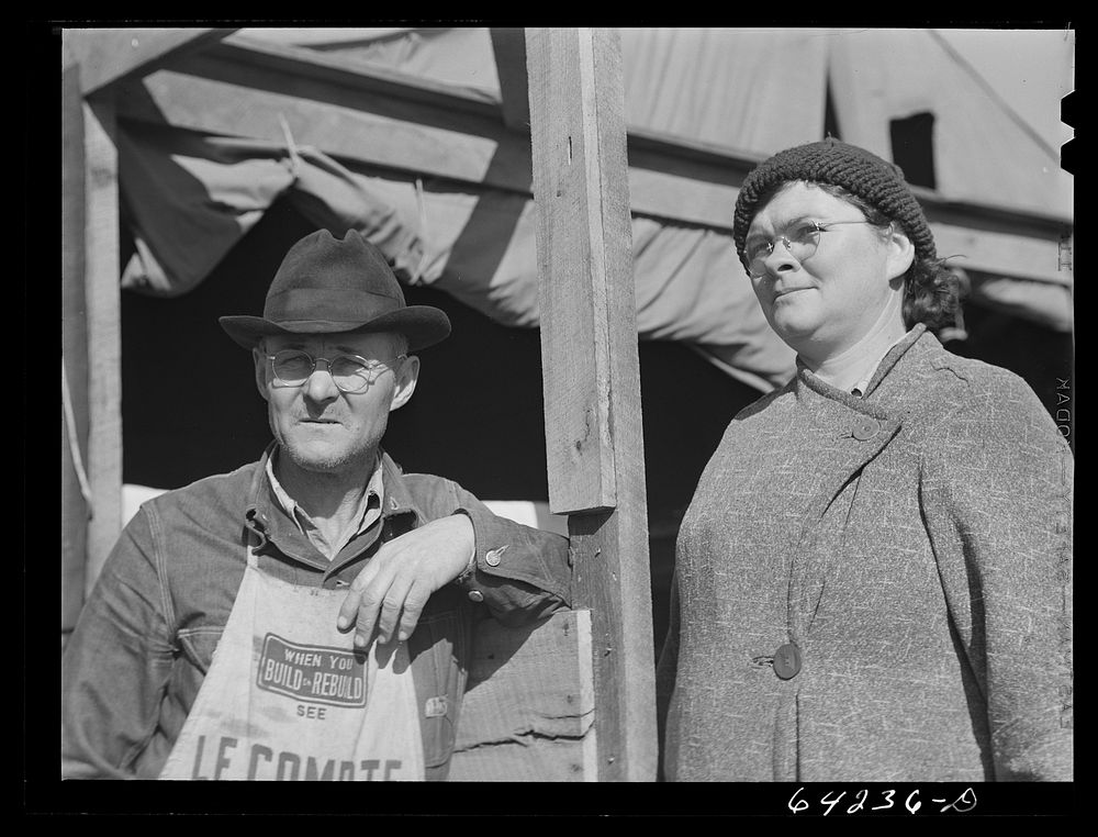 Newton County, Missouri. Camp Crowder area. Farm couple from neighboring county. He came to this area for construction work.…