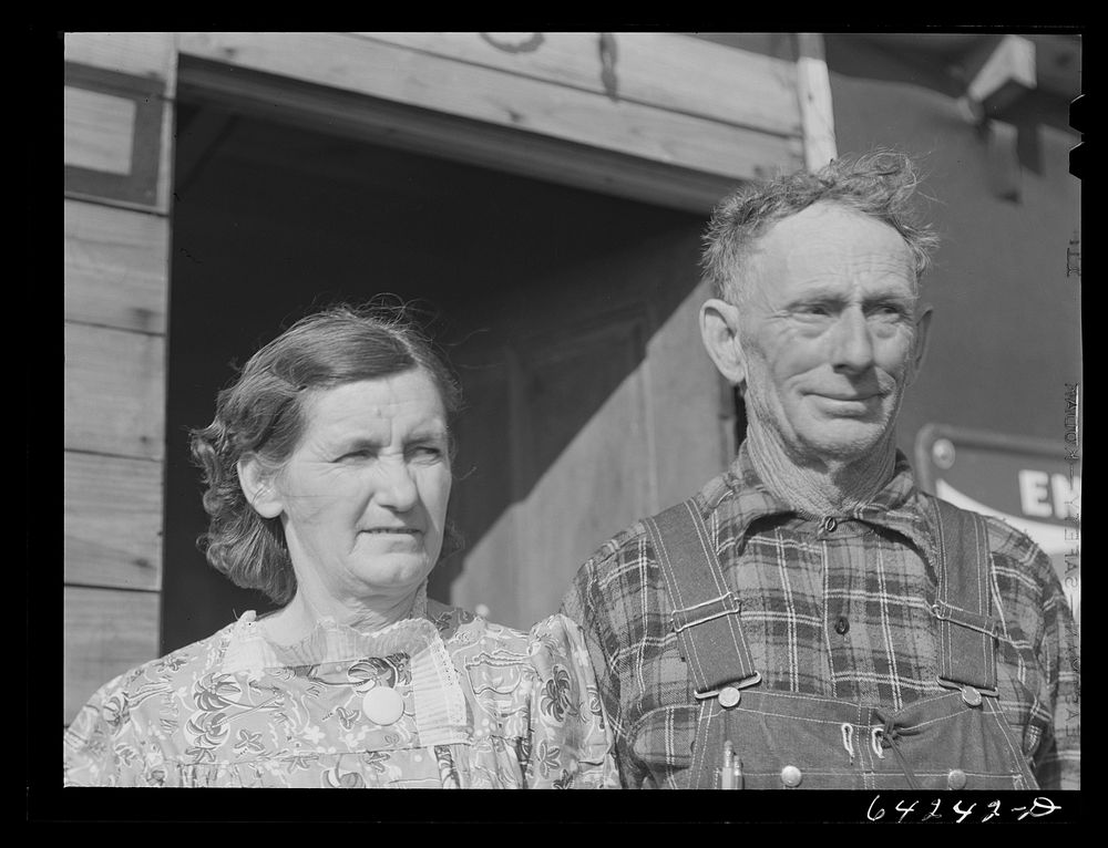 [Untitled photo, possibly related to: Farm couple who left farm and followed the boom]. Sourced from the Library of Congress.