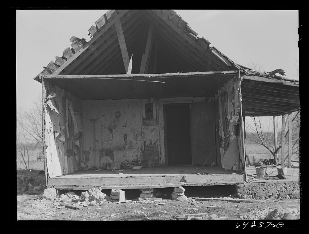 Newton County, Missouri. Camp Crowder area. Farmhouses on land bought by the Army are demolished when construction work…