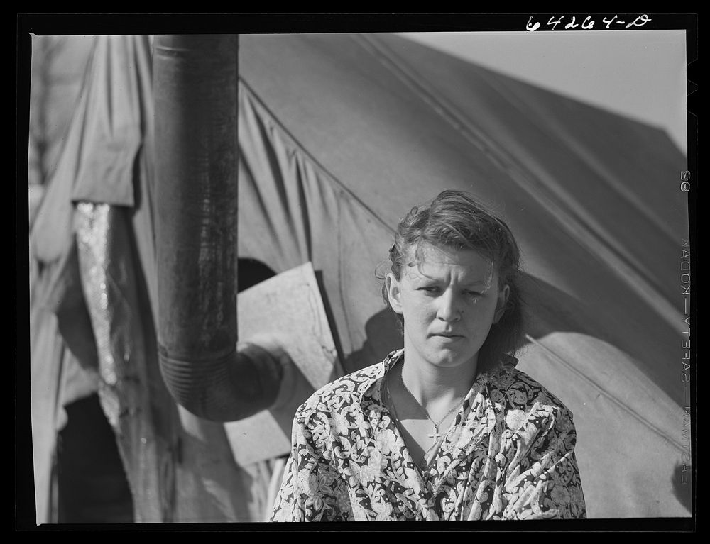 Newton County, Missouri. Camp Crowder area. Wife of construction worker from Oklahoma living in tent along U.S. Highway No.…