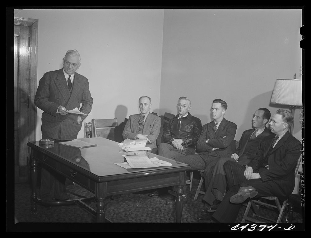 Athens, Ohio. H.D. Palmer, executive director of the civilian defense council, addressing a meeting of the utilities…