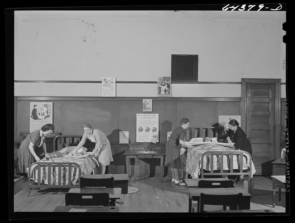 Portsmouth, Ohio. Red Cross class of women volunteers under the civilian defense program. Sourced from the Library of…