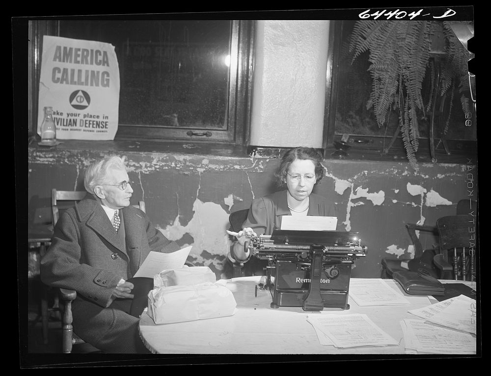 Marietta, Ohio. Old lawyer, veteran of Spanish-American War, registering for civilian defense in basement of the courthouse.…