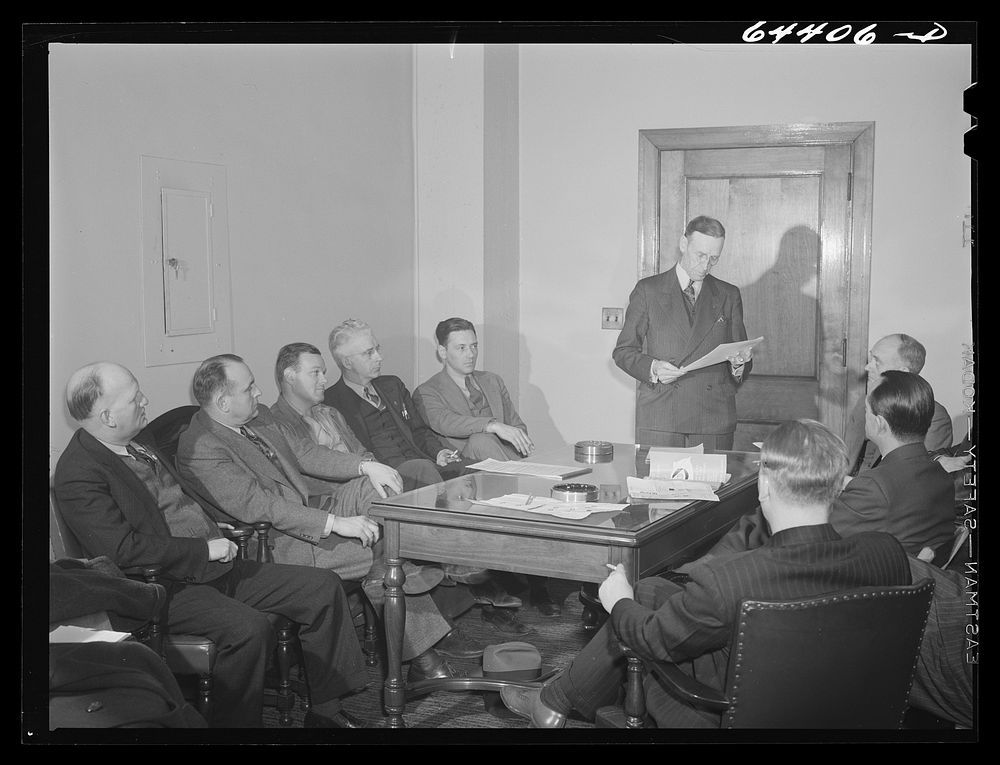 Athens, Ohio. Mayor Franz Woodworth addressing a meeting of the utilities division of the Athens civilian defense council.…